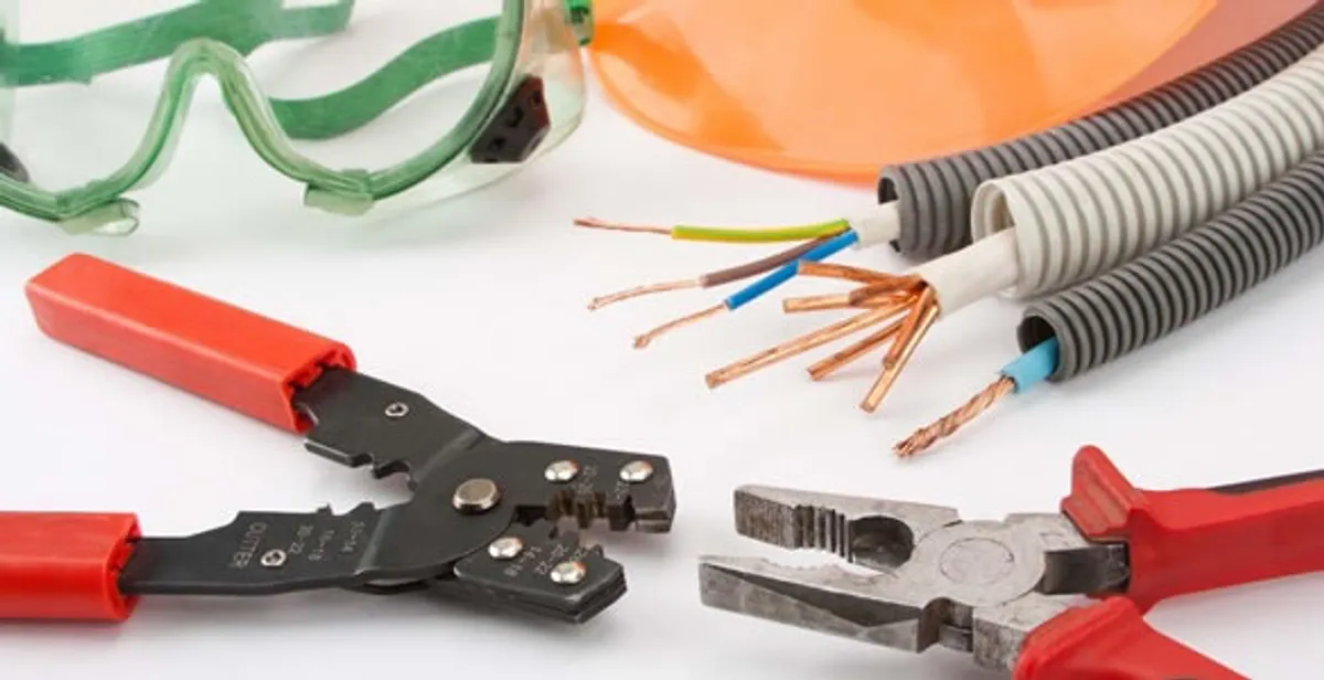 Electrical wiring repair with professional tools and safety equipment in Henderson, CO
